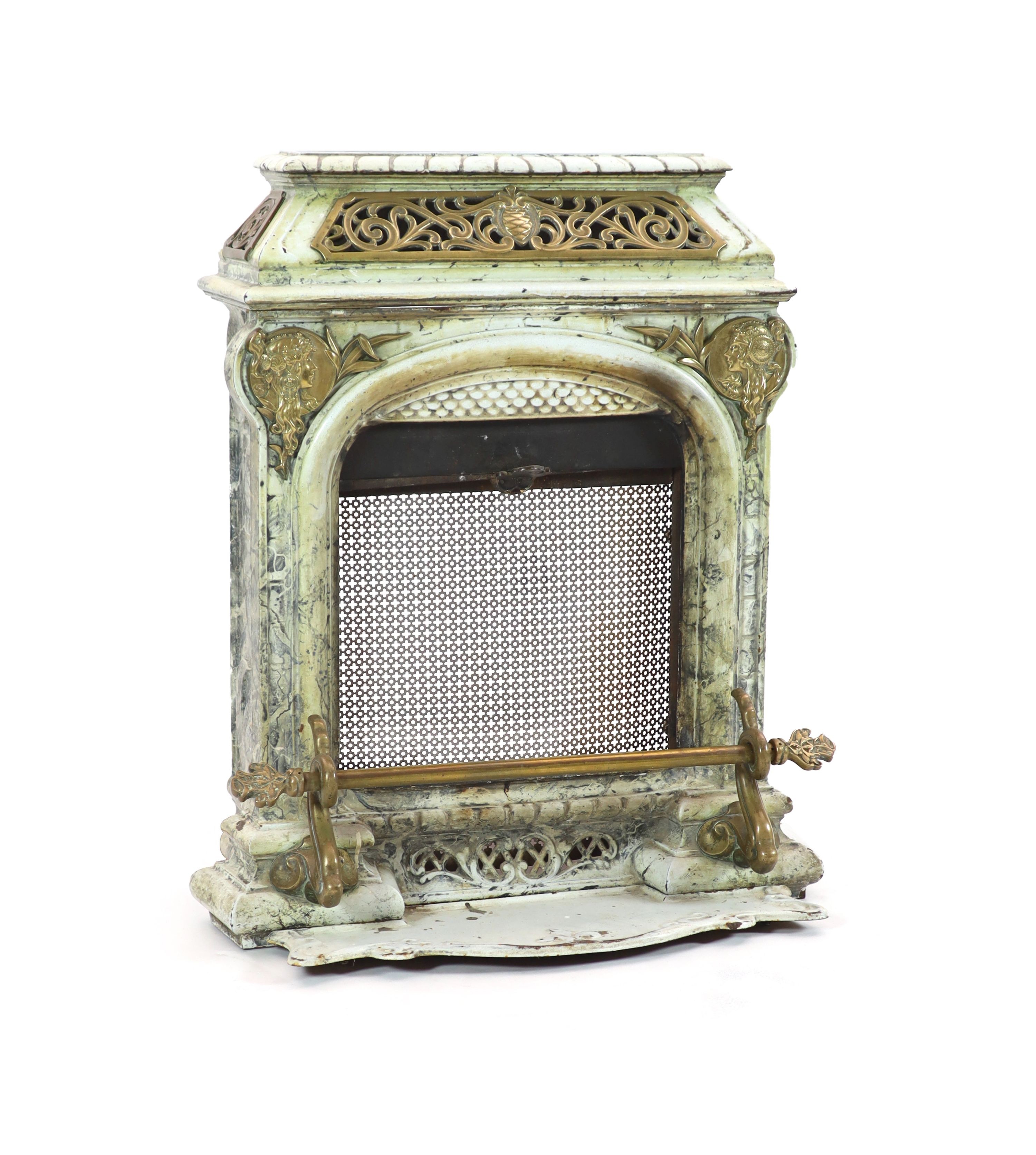 A late 19th century French Art Nouveau enamelled cast iron and brass fire surround H 91cm. W 82cm. D 46cm.